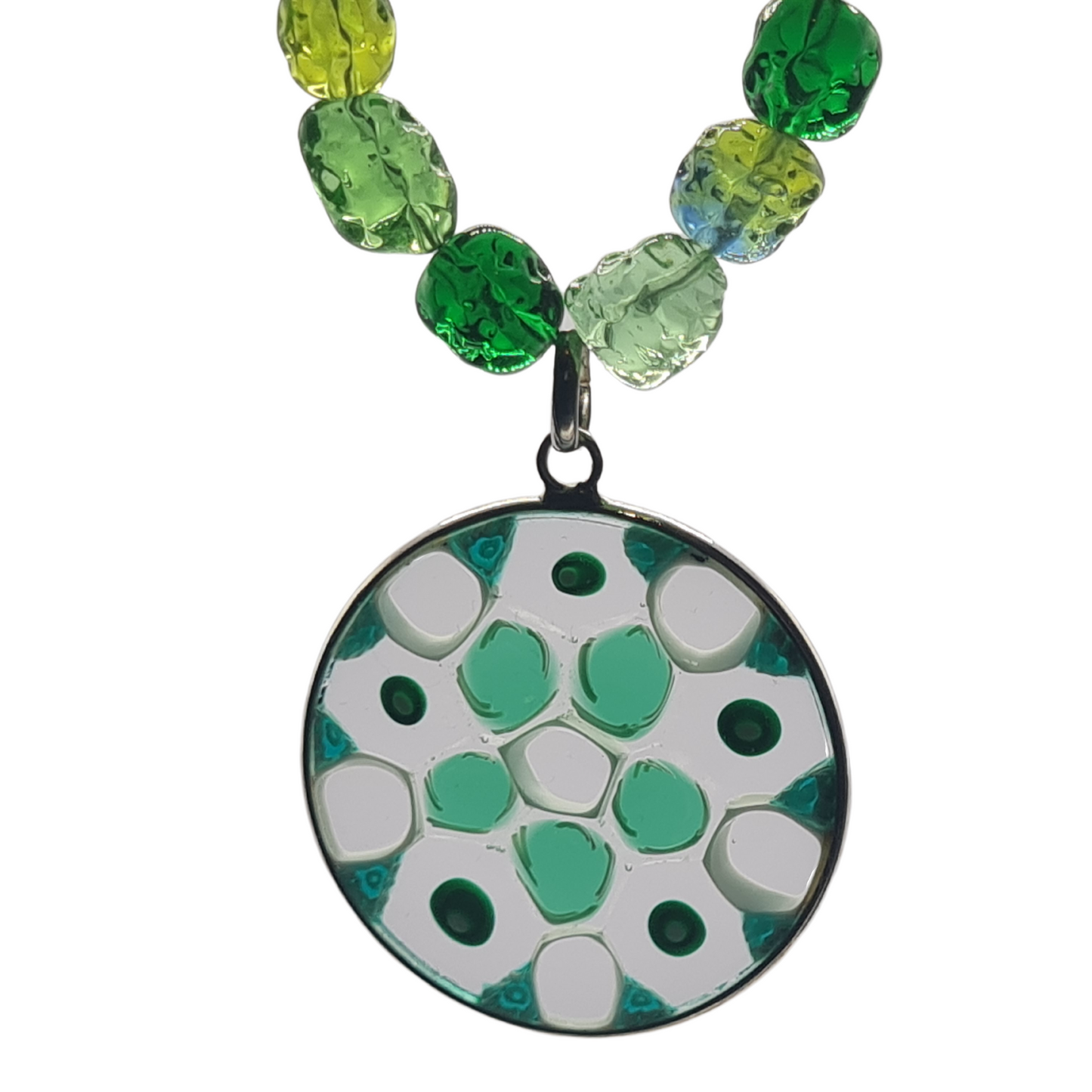 detail of an intricate green millefiori murrina