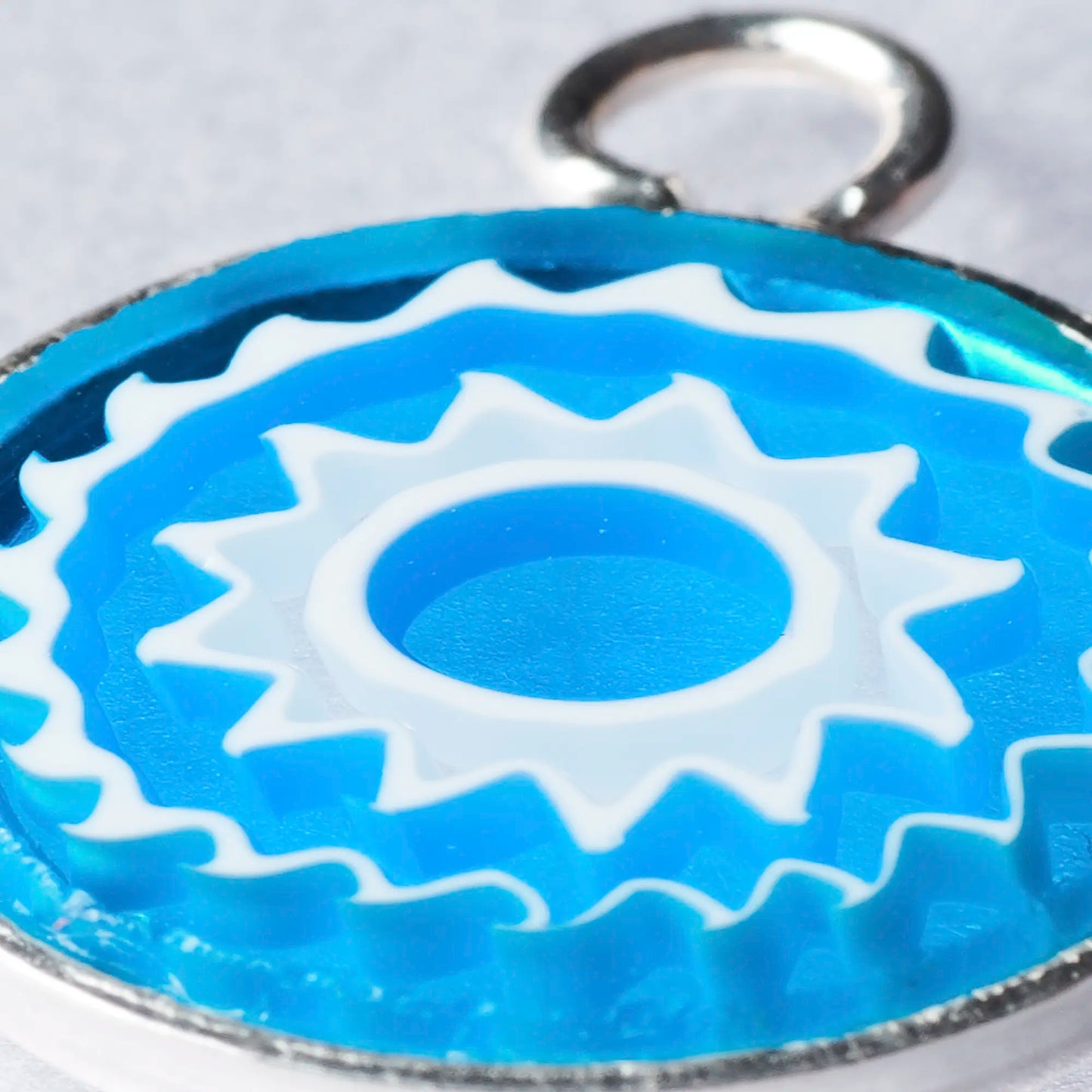 Close up of millefiori murrina glass pendant earring