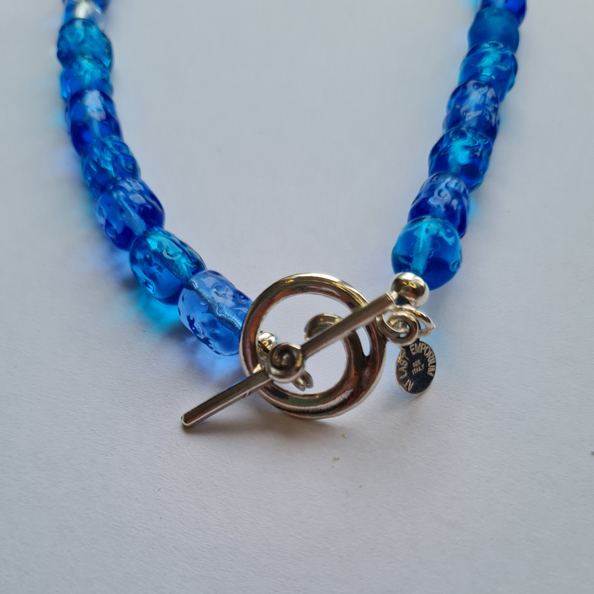 silver sterling fastener swirl blue beads
