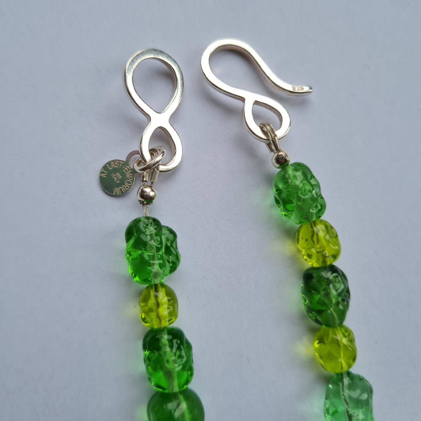 sterling silver fastener green glass beads